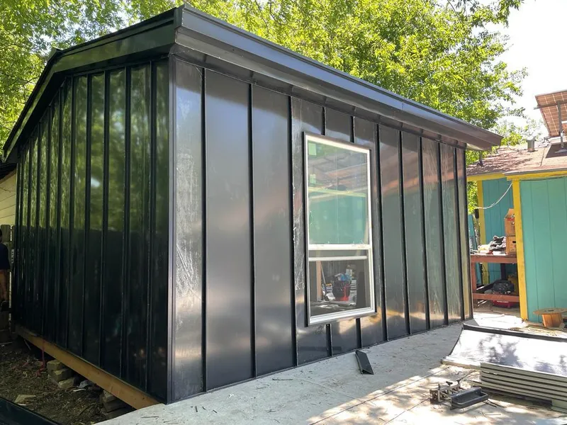 Black standing seam metal wall panels for Roof Inspection in Pontiac